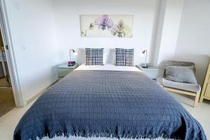 Posteľ alebo postele v izbe v ubytovaní LL- Cozy apartment just next to the beach