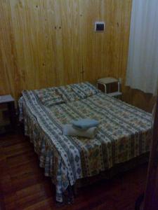 Een bed of bedden in een kamer bij Cabañas Sueño Azul
