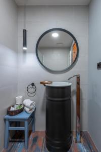 a bathroom with a sink and a mirror at Art Hotel Prague in Prague