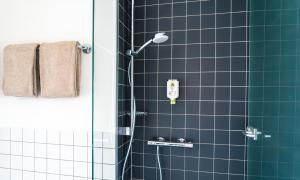 Koupelna v ubytování SLEEEP HOTEL Ansfelden