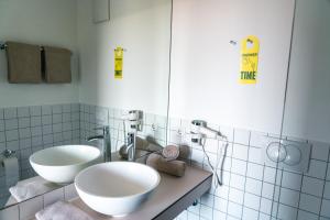 Ванна кімната в SLEEEP HOTEL Ansfelden