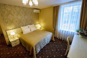 Кровать или кровати в номере Мини-отель комплекса "Русский Пар"