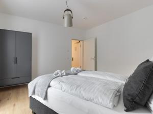 Postel nebo postele na pokoji v ubytování limehome Gütersloh Eickhoffstraße