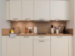 Kuchyň nebo kuchyňský kout v ubytování limehome Gütersloh Eickhoffstraße