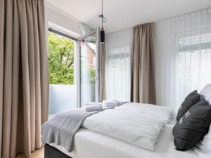 Postel nebo postele na pokoji v ubytování limehome Gütersloh Eickhoffstraße