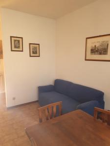 Ein Sitzbereich in der Unterkunft Francigena House Monteroni