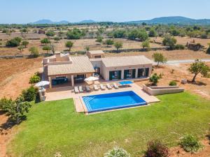 an aerial view of a house with a swimming pool at Finca Xorca in Caʼs Concos