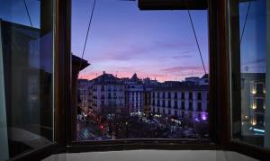 Nespecifikovaný výhled na destinaci Granada nebo výhled na město při pohledu z penzionu