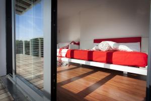 A bed or beds in a room at Stay Michelangelo Jesolo Only Adults