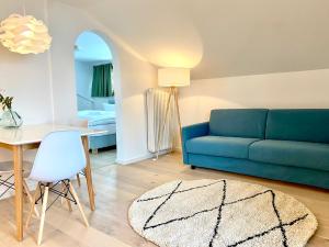 Posezení v ubytování Feine FeWo im DG am Tegernsee