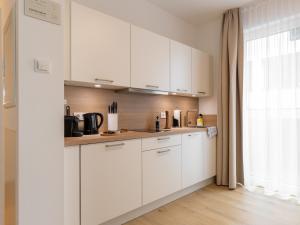 Kuchyň nebo kuchyňský kout v ubytování limehome Gütersloh Eickhoffstraße