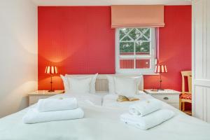 Ένα ή περισσότερα κρεβάτια σε δωμάτιο στο Arielle Nr. 1