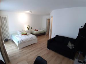 Ένα ή περισσότερα κρεβάτια σε δωμάτιο στο LEA Apartment Zentrum Nord