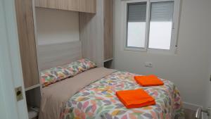 Posteľ alebo postele v izbe v ubytovaní Stylish & Spacious Family Apartment Near Beach & Vibrant Historic Market