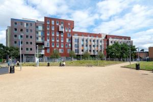 a group of tall buildings in a city at For Students Only Private Bedroom with Shared Kitchen at Athena Hall in Ipswitch in Ipswich