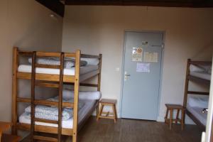 Llit o llits en una habitació de Gîte le Moulin