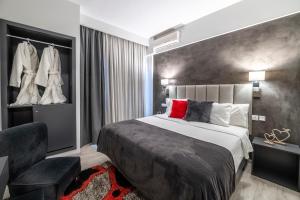Postel nebo postele na pokoji v ubytování Lingos Hotel