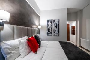 Postel nebo postele na pokoji v ubytování Lingos Hotel
