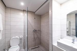 Koupelna v ubytování Lingos Hotel