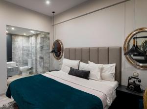 Postel nebo postele na pokoji v ubytování Lingos Hotel