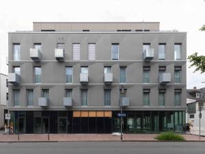 Budova, kde se aparthotel nachází + 37 fotografií