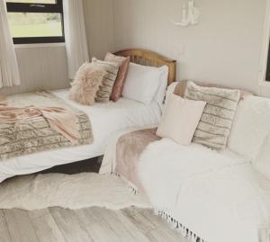 a living room with a couch and a bed and a chair at Ribble Valley Retreat in Langho