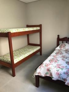 Tempat tidur susun dalam kamar di Quiosque 1