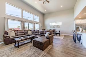 a living room with a couch and a table at Pacific Breeze in Gold Beach