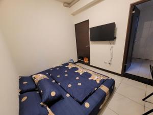 Voodi või voodid majutusasutuse Gaomei 607 Homestay toas