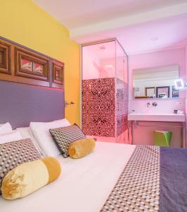 Posteľ alebo postele v izbe v ubytovaní Hotel Lampara