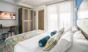 Posteľ alebo postele v izbe v ubytovaní Hotel Lampara