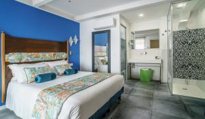 Posteľ alebo postele v izbe v ubytovaní Hotel Lampara