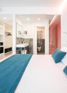 Posteľ alebo postele v izbe v ubytovaní Hotel Lampara