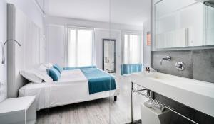 Posteľ alebo postele v izbe v ubytovaní Hotel Lampara