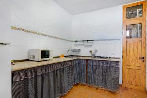 A kitchen or kitchenette at Mirador de Domingo
