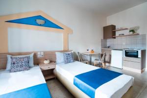 Kuchyň nebo kuchyňský kout v ubytování Ilios Malia Hotel Resort
