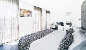 Posteľ alebo postele v izbe v ubytovaní Hotel Lampara