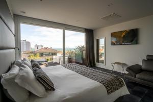Posteľ alebo postele v izbe v ubytovaní Hotel Lampara