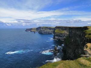 an aerial view of the ocean with a cliff at Puffin rooms in Lisdoonvarna