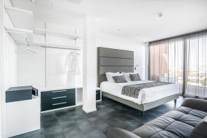 Posteľ alebo postele v izbe v ubytovaní Hotel Lampara