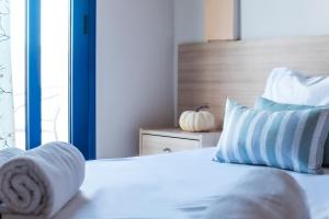 Ilios Malia Hotel Resort客房内的一张或多张床位