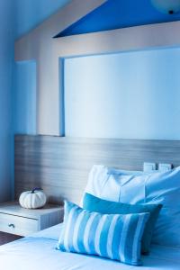Ilios Malia Hotel Resort客房内的一张或多张床位