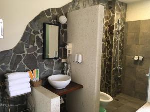 Koupelna v ubytování Qiao Kela Ti Homestay
