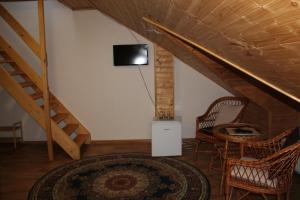 TV a/nebo společenská místnost v ubytování Penzion Krcma