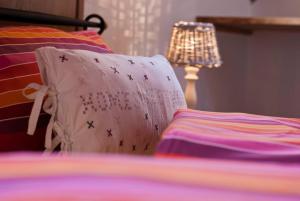 Ein Bett oder Betten in einem Zimmer der Unterkunft Pension Margarete