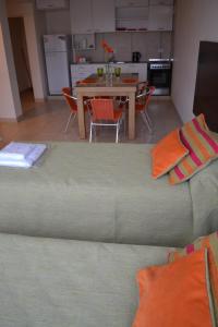 a living room with a couch and a table at Departamentos Giova in Salta +3 photos