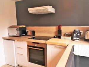 Kuchyň nebo kuchyňský kout v ubytování La Mezzanine par Picardie Homes