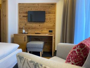 TV a/nebo společenská místnost v ubytování Hotel Menning ***S