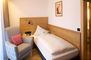 Postel nebo postele na pokoji v ubytování Hotel Menning ***S