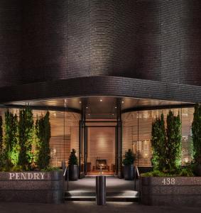 a lobby with a table in front of a building at Pendry Manhattan West in New York